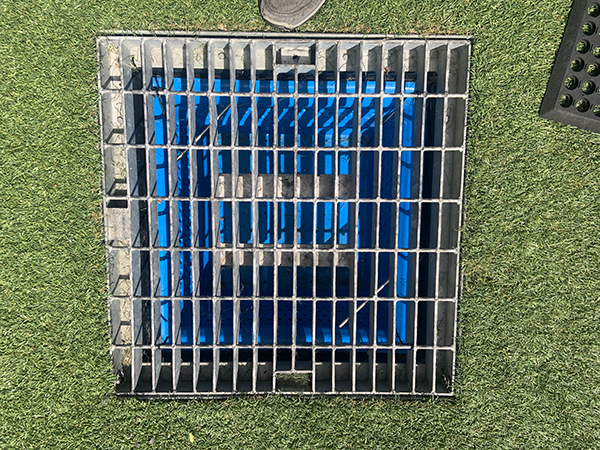 Grated FF600 pit with blue removable basket at Neptune Marina